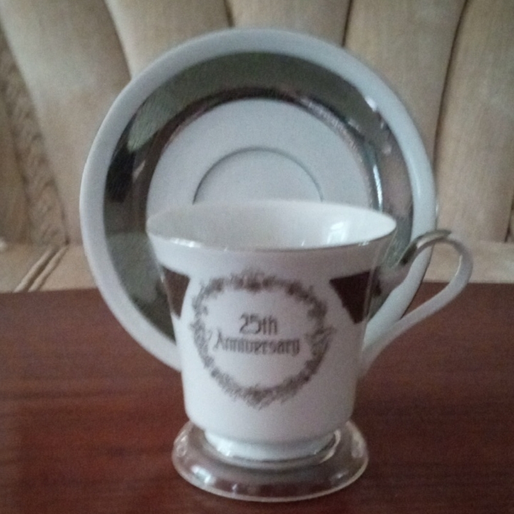 Rolex 25th Anniversary Silver Tea Cup and Saucer Set